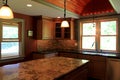 Gorgeous examples of marble countertops and lighting in construction of modern kitchen