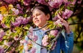 Gorgeous flower and female beauty. Girl cherry flower background. Sakura tree blooming. Park and garden. Small girl Royalty Free Stock Photo