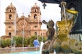 Fountain with Church of the Society of Jesus or Iglesia de la Compania de Jesus in the Backdrop, Historic Center of Cusco