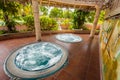 Gorgeous fragment of view of outdoor spa with hydro massage Jacuzzi