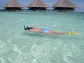 Gorgeous girl snorkelling