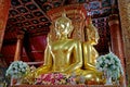 Gorgeous Golden Four-sided Seated Buddha Images of Wat Phumin Temple, a Famous Buddhist Temple in Nan Province, Thailand Royalty Free Stock Photo