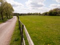 A Gorgeous Green Field and Blue Skies with White Clouds, As well Royalty Free Stock Photo