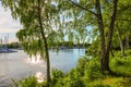 Gorgeous green nature landscape view. Parking place for motor boats on beautiful lake in  forest Royalty Free Stock Photo