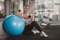 Beautiful young fitness woman working out at the gym Royalty Free Stock Photo