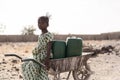 Gorgeous Indigenous Woman Bringing Fresh Water for an insufficiency concept Royalty Free Stock Photo