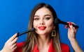 Gorgeous lady make up red lips. Attractive woman applying makeup brush. Perfect skin tone. Stunning beauty. Looking good Royalty Free Stock Photo