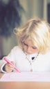 Gorgeous little girl drawing Royalty Free Stock Photo