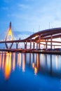 Gorgeous low angle view of highway interchange and suspension bridges at dusk Royalty Free Stock Photo