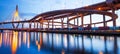 Gorgeous low angle view of highway interchange and suspension bridges at dusk Royalty Free Stock Photo