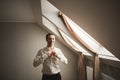 Gorgeous man, groom prepares for wedding ceremony in luxury hotel Royalty Free Stock Photo