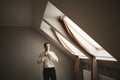 Gorgeous man, groom prepares for wedding ceremony in luxury hotel Royalty Free Stock Photo