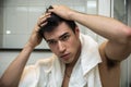 Gorgeous Man after his Shower Holding his Head Royalty Free Stock Photo