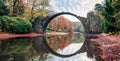 Gorgeous morning pznorama of Azalea and Rhododendron Park Kromlau, Germany, Europe. Incredible autumn view of Rakotz Bridge