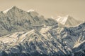 Gorgeous Mountain Chain Covered with Snow in Stunning Gold Sunlight