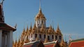 Gorgeous multi-tiered Loha Prasat rises above temple`s roofs