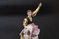 Gorgeous old figurine of a ballerina and her partner performing the adagio (slow part of the dance).