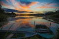 Gorgeous orange sunset reflected in the calm water