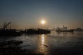 Gorgeous panorama scenic of cargo ship in the middle river and industrial factory along Chao phraya river front in the morning