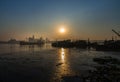 Gorgeous panorama scenic of cargo ship in the middle river and industrial factory along Chao phraya river front in the morning