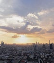 Gorgeous panorama scenic of the sunrise or sunset with cloud on the orange and blue sky over large metropolitan city in Bangkok Royalty Free Stock Photo