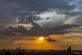 Gorgeous panorama scenic of the sunrise or sunset with cloud on the orange and blue sky over large metropolitan city in Bangkok Royalty Free Stock Photo