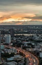 Gorgeous panorama scenic of the sunrise or sunset with cloud on the orange and blue sky over large metropolitan city in Bangkok Royalty Free Stock Photo