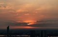 Gorgeous panorama scenic of the sunrise or sunset with cloud on the orange sky over large metropolitan city in Bangkok Royalty Free Stock Photo