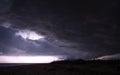 Gorgeous photo of the storm clouds passing by the beach of the sea of Azov Royalty Free Stock Photo