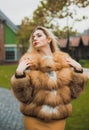 Luxury fur coat concept. Woman in furs