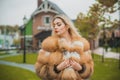 Luxury fur coat concept. Woman in furs