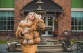 Luxury fur coat concept. Woman in furs