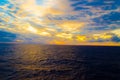 Intense orange sunset at remote isolated tropical beach