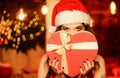 Gorgeous Santa girl. Stunning beauty. Christmas decorations. Festive mood. Woman attractive playful lady celebrate Royalty Free Stock Photo