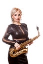 Attractive saxophonist woman playing at her musical instrument Royalty Free Stock Photo