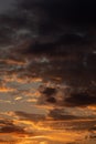 Gorgeous scenic of the sunrise or sunset with dark lining and cloud on the orange sky. Vibrant and Colorful background