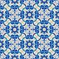Gorgeous seamless patchwork pattern from dark blue and white Moroccan, Portuguese tiles, Azulejo, ornaments. Royalty Free Stock Photo