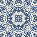 Gorgeous seamless patchwork pattern from dark blue and white Moroccan tiles, ornaments. Royalty Free Stock Photo