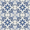 Gorgeous seamless patchwork pattern from dark blue and white Moroccan tiles, ornaments. Royalty Free Stock Photo