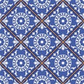 Gorgeous seamless pattern from dark blue and white Moroccan, Portuguese tiles, Azulejo, ornaments.