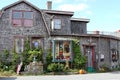 Gorgeous seaside shop with old weathered shingles and signs welcoming guests in, Rockport, Massachusetts, 2018