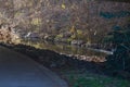 A gorgeous shot of the rushing waters of Little Sugar Creek flowing over the rocks surrounded by gorgeous autumn colored trees Royalty Free Stock Photo