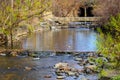 A gorgeous shot of the rushing waters of Little Sugar Creek flowing over the rocks surrounded by gorgeous autumn colored trees Royalty Free Stock Photo