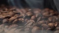 Gorgeous shots of close up coffee roast and smoke coming from coffee beans on black background