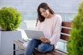 Gorgeous smart woman using her laptop