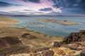 a gorgeous spring landscape at Lake Mead with vast blue water and majestic mountain ranges and boats and yachts docked Royalty Free Stock Photo