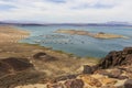 a gorgeous spring landscape at Lake Mead with vast blue water and majestic mountain ranges and boats and yachts docked Royalty Free Stock Photo