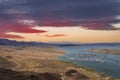 a gorgeous spring landscape at Lake Mead with vast blue water and majestic mountain ranges and boats and yachts docked Royalty Free Stock Photo