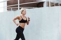 Gorgeous strong young sports woman running Royalty Free Stock Photo