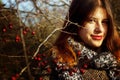 Gorgeous stylish beautiful happy brunette girl and red berries o Royalty Free Stock Photo